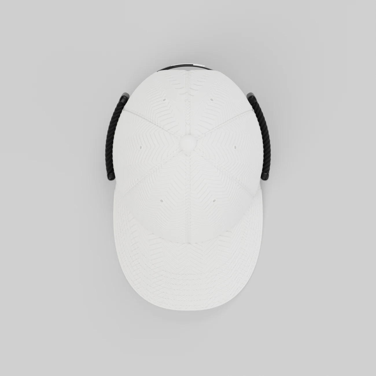 Top view: panel seams converging at the covered button